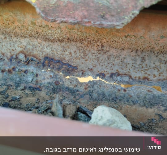 תמונה של חלודה על מתכת, מראה נזק פוטנציאלי